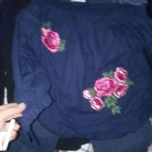 Cute embroidered off-the-shoulder shirt